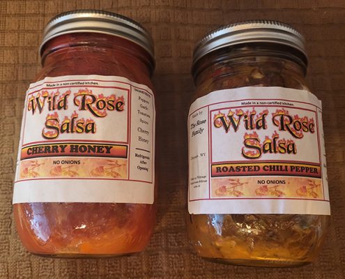 Jars of Wild Rose Salsa, cherry honey and roasted chili pepper